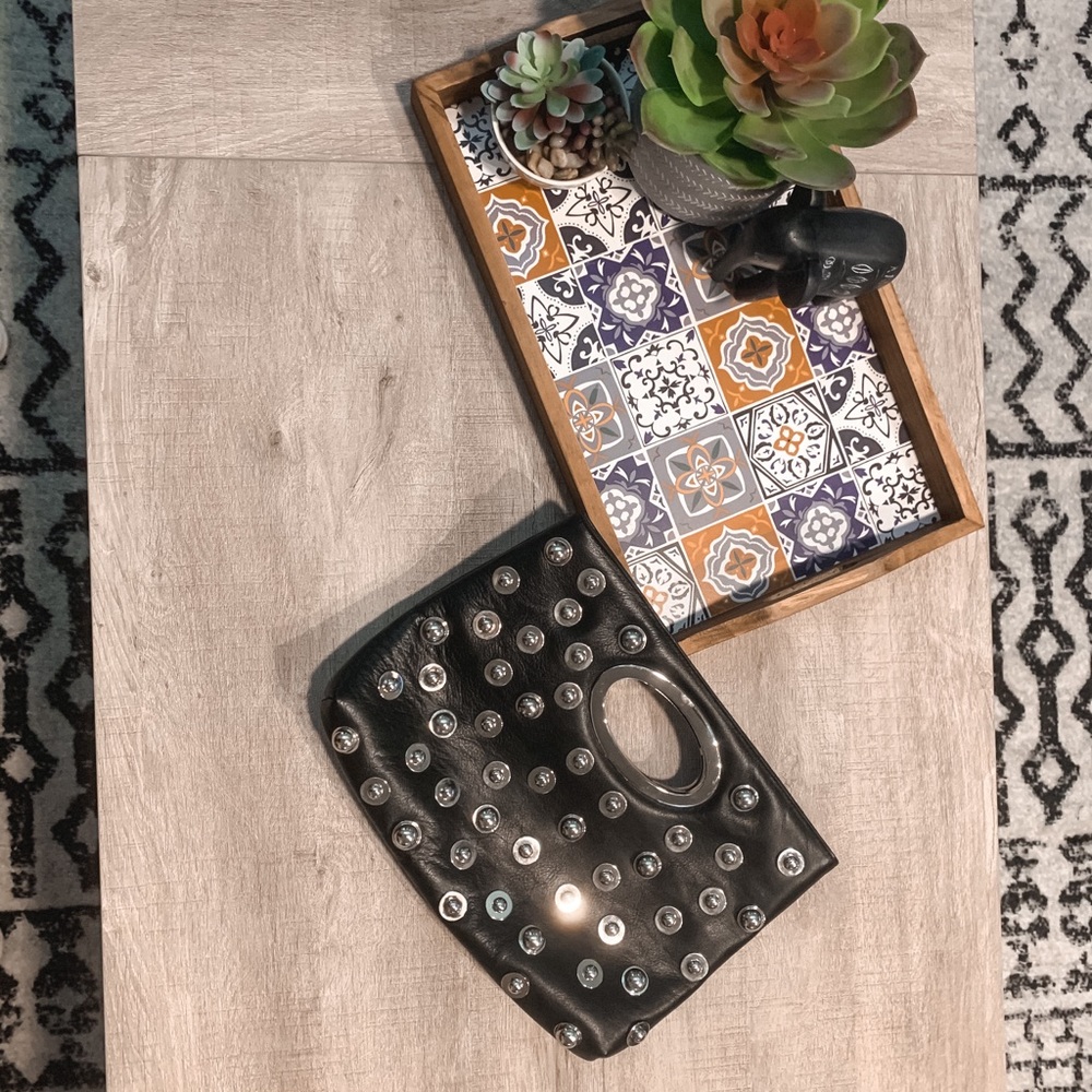 Donald pliner black studded clutch